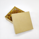 Gold gift box with paper filler